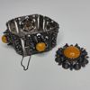 Vintage Silverarmband ach brosch med bärnstensdetaljer. Lettland 1900-tal.,andra hälf.